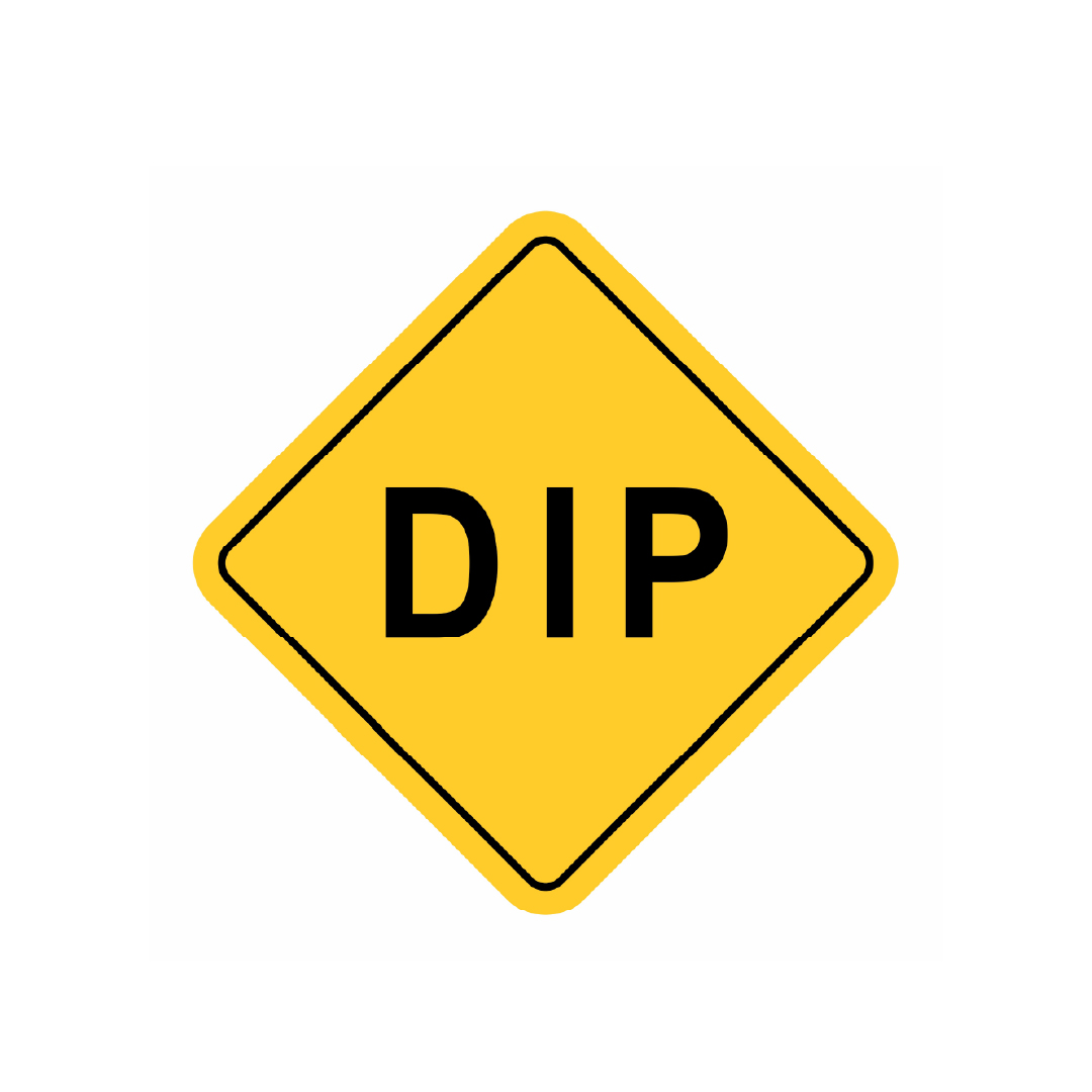 Yellow diamond-shaped road sign with the word "DIP" in bold black letters,.