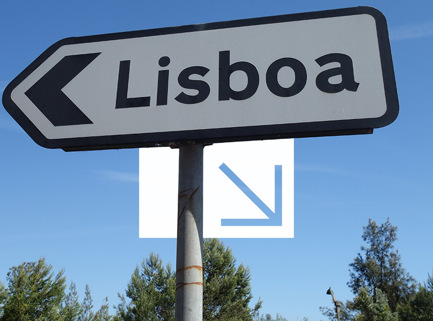Road sign pointing toward Lisboa, used to illustrate Portuguese road signs and the importance of car hire excess insurance when driving in Portugal.