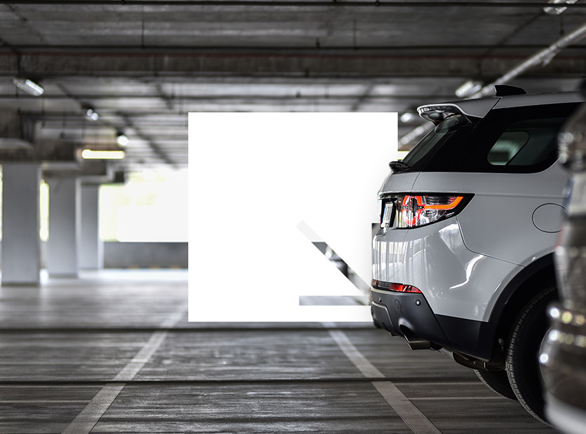 SUV parked inside an underground car park, illustrating situations where car hire excess insurance can help if damage occurs.